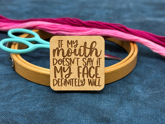 Photo of a needle minder featuring the quote, 